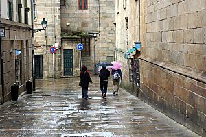 In downtown Santiago de Compestela, it's raining cats and dogs.