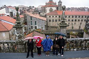 Everyone bundled up in the rain.