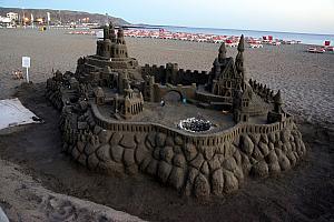 Impressive sand castle along the beach.