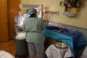 May 12. 10:59PM. NICU nurses prep the room for delivery.