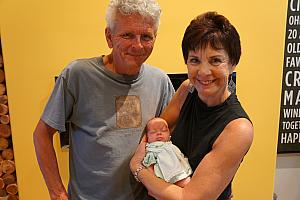 Grandma and Grandpa Klocke visiting with Capri at home.