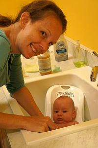 Taking a bath in the laundry room sink.