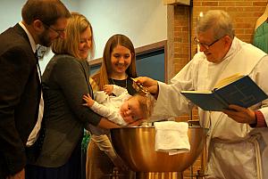 Baptism in progress!