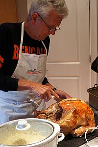 Grandpa Klocke carving the turkey -- we celebrated the Bengals victory with an early Thanksgiving celbration.