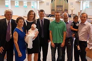 The baptismal dress that Capri is wearing has been worn by every member of the Klocke family for 70+ years -- here's a photo of some of the wearers.,