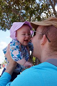 Capri and Daddy playing.