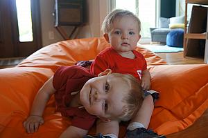 Coop and Benny playing with the beanbag chair
