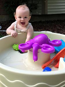 Playing with buddy Thomas's water table