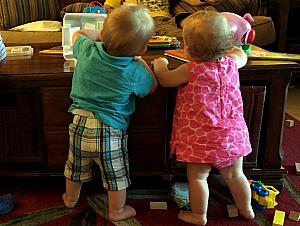 Playing blocks on the coffee table.