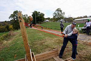 Mike and Cardin slinging a pumpkin