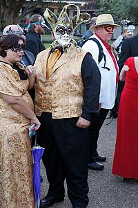 In front of the church was a group of people dressed for a masquerade ball. Fun.