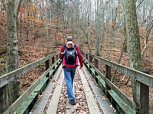 Walking across a bridge.