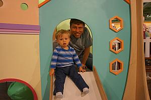 Thomas and Brian playing on the slide