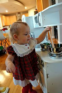 Playing with her new kitchen set!