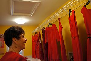 Grammy Klocke looking at her store of red dresses -- she got to pick two to keep.
