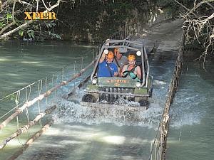 Now it's Kevin and Kyleen and Dad's turn to go through Xplor. ATV riding!