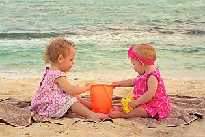 Capri and Kenley playing in the sandsand