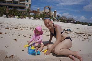 Capri and Mom playing in the sand