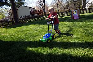 Benny playing with his new lawnmower