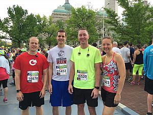 Kelly and Landon and Adam and Landon's cousin Michael - all getting ready to run the Indianapolis Mini Marathon (half marathon)