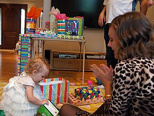 Opening her gifts