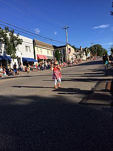 Capri walking down the street waiting for the Madeira 4th of July parade