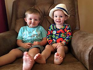 Capri and Benny hanging on the recliner