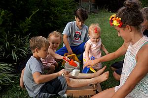 All the kids playing in the sandbox