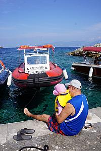 Papa and Capri checking out our 250hp speed boat.