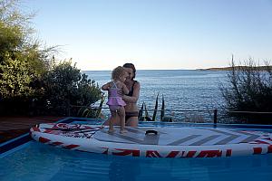 Capri on a stand-up paddleboard!