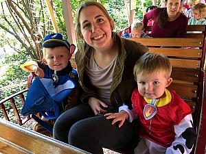 Aunt Julie riding on the train with Cooper and Benny