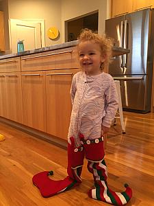 She pulled these stocking off the door knobs and put them on! So fun.