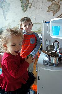 Capri and Benny playing in the toy kitchen!