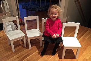 Capri modeling her new chairs :)
