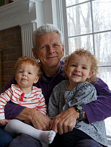 Grandpa having fun with his favorite granddaughters