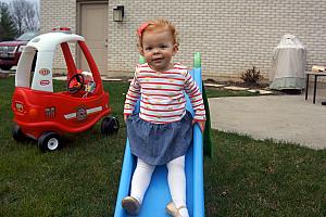 Kenley going down the slide