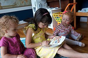 Anna reading to Capri and Kenley