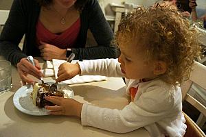 Capri and Mommy digging in to our carrot cake dessert