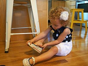 Putting on her shoes