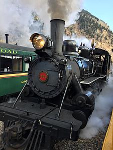 And 10 minutes later, sure enough, it was! Here's a steam engine rolling by as it gets ready to attach to the train. This is the Georgetown Loop Train.