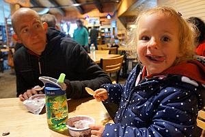 Capri was excited to eat some yogurt in the visitor's center.