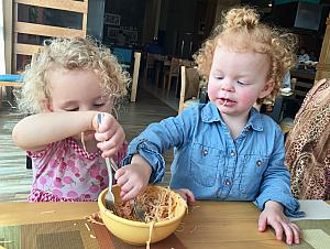 Capri and Kenley shared their food lots this week -- here they are eating spaaghetti and salmon out of the same bowl :)