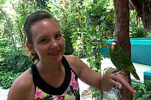 Visiting Crococun animal rescue zoo -- Kelly holding a birdie