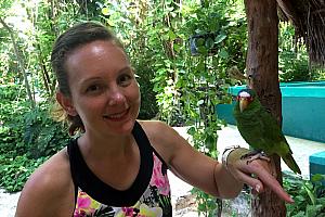 Visiting Crococun animal rescue zoo -- Kelly holding a birdie