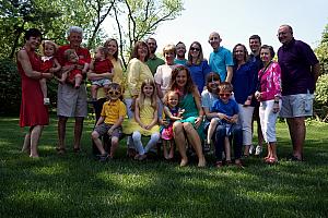 The whole family decked out in the rainbow to celebrate the rainbow birthday theme.