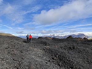 No more snow fields. Lava field (now volcanic rock) near Magni crater. On an ascend, shortly before this photo, Kelly had her one fall of the day. She lost my footing in the loose volcanic rock and slid a bit down the path tearing her new rain pants - Luckily no injuries!