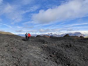 No more snow fields. Lava field (now volcanic rock) near Magni crater. On an ascend, shortly before this photo, Kelly had her one fall of the day. She lost my footing in the loose volcanic rock and slid a bit down the path tearing her new rain pants - Luckily no injuries!