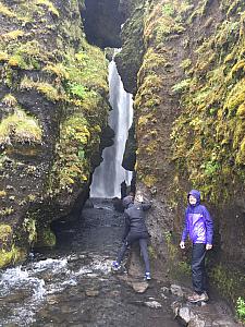 Kelly journeying into a hidden cavern waterfall